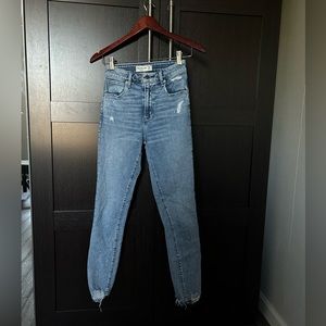 Super skinny ankle high rise jean in blue - Abercrombie & Fitch.